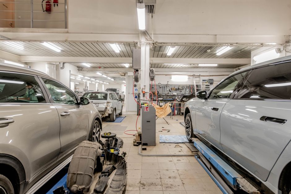 Professional team collaboration in paint protection installation and vehicle care services