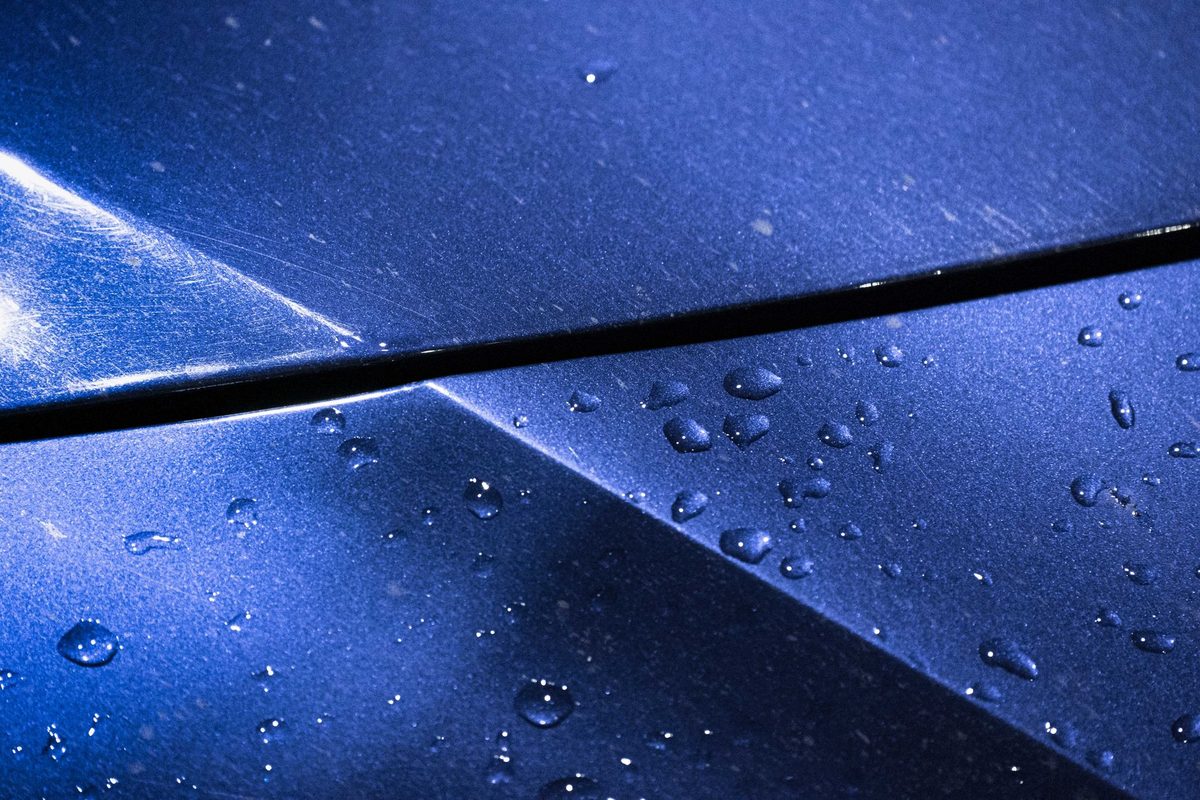 Modern paint correction service demonstrating professional polishing techniques and equipment